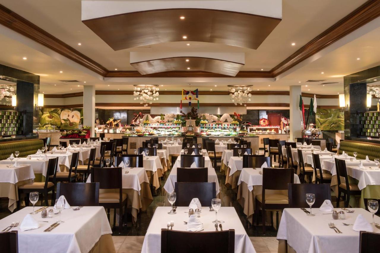 Grand Sunset Princess Playa del Carmen Exterior foto The interior of the restaurant
