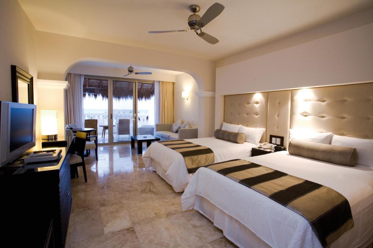 Grand Sunset Princess Playa del Carmen Exterior foto A room at the Grand at Moon Palace